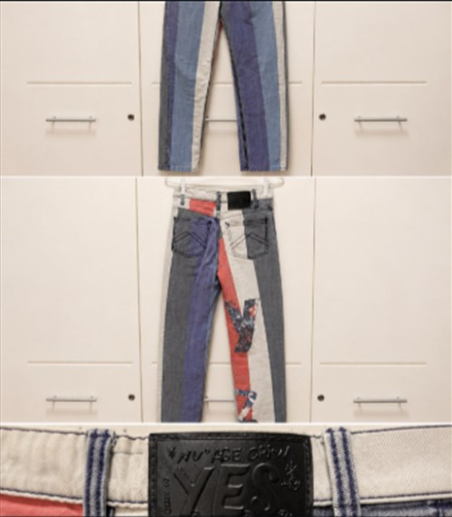 Calça Jeans com Detalhe Colorido — Jeans & Calças